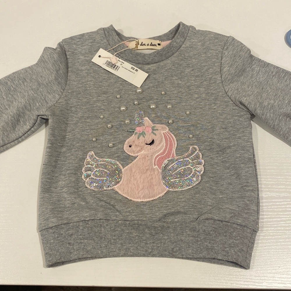 Doe a dear unicorn toddler sweatshirt with sequin and pearl details